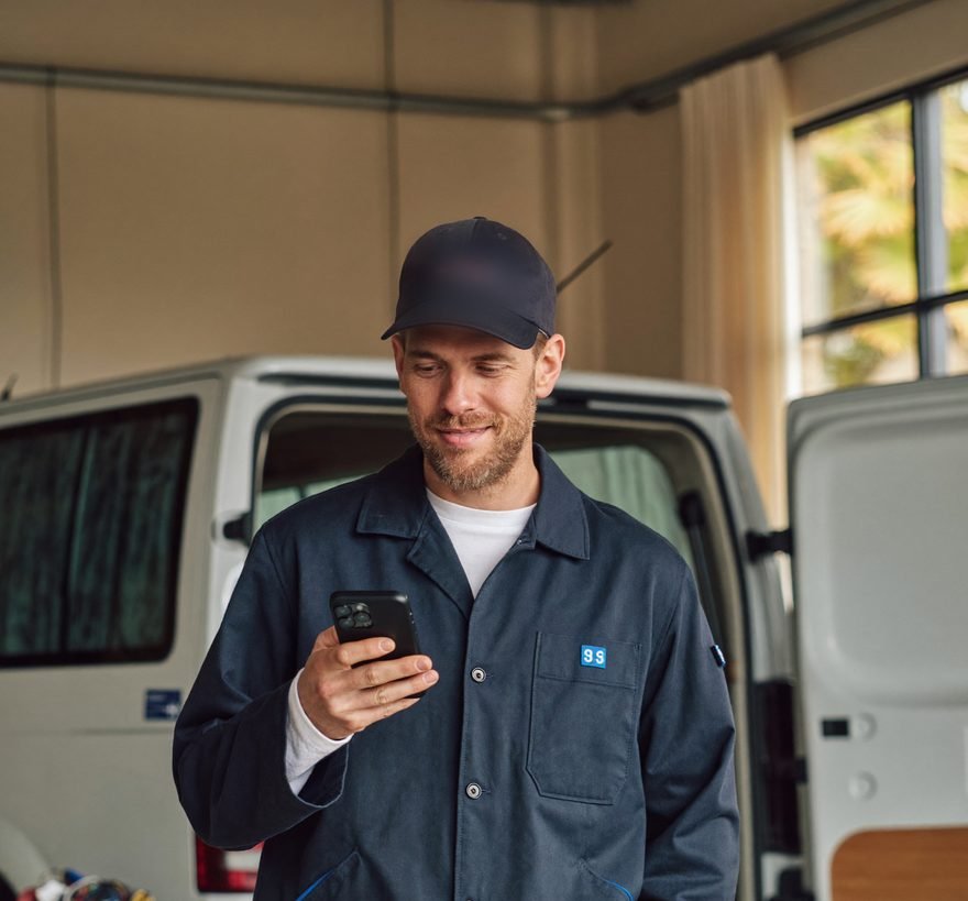 A tradesman manages his campaigns from his phone